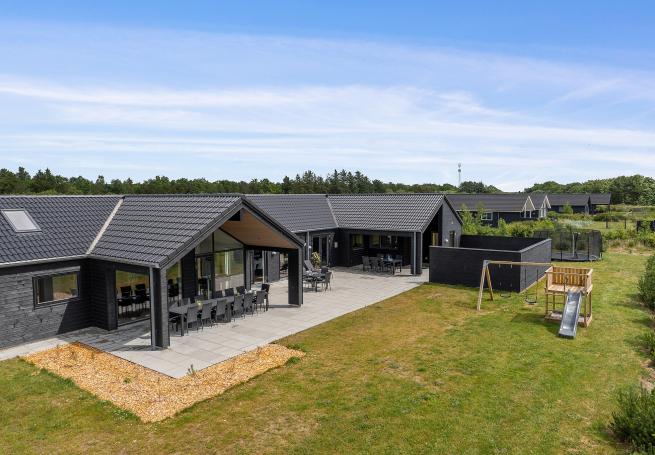 Dieses schöne Poolhaus Nr. 605 mit Platz für 24 Personen liegt in Westjütland