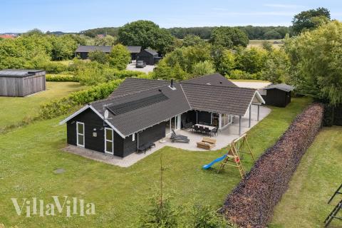 Dieses schöne Poolhaus Nr. 268 mit Platz für 14 Personen liegt in Ostjütland