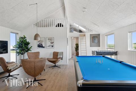 Das Luxusferienhaus 667 für 18 Personen hat einen großen Aktivitätsraum mit u. a. Billard und Darts