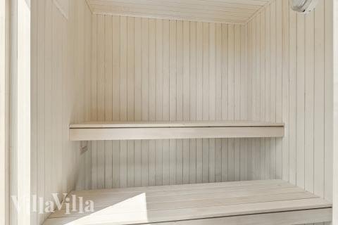 Genießen Sie die heiße Sauna im Luxusferienhaus Nr. 667 für 18 Personen