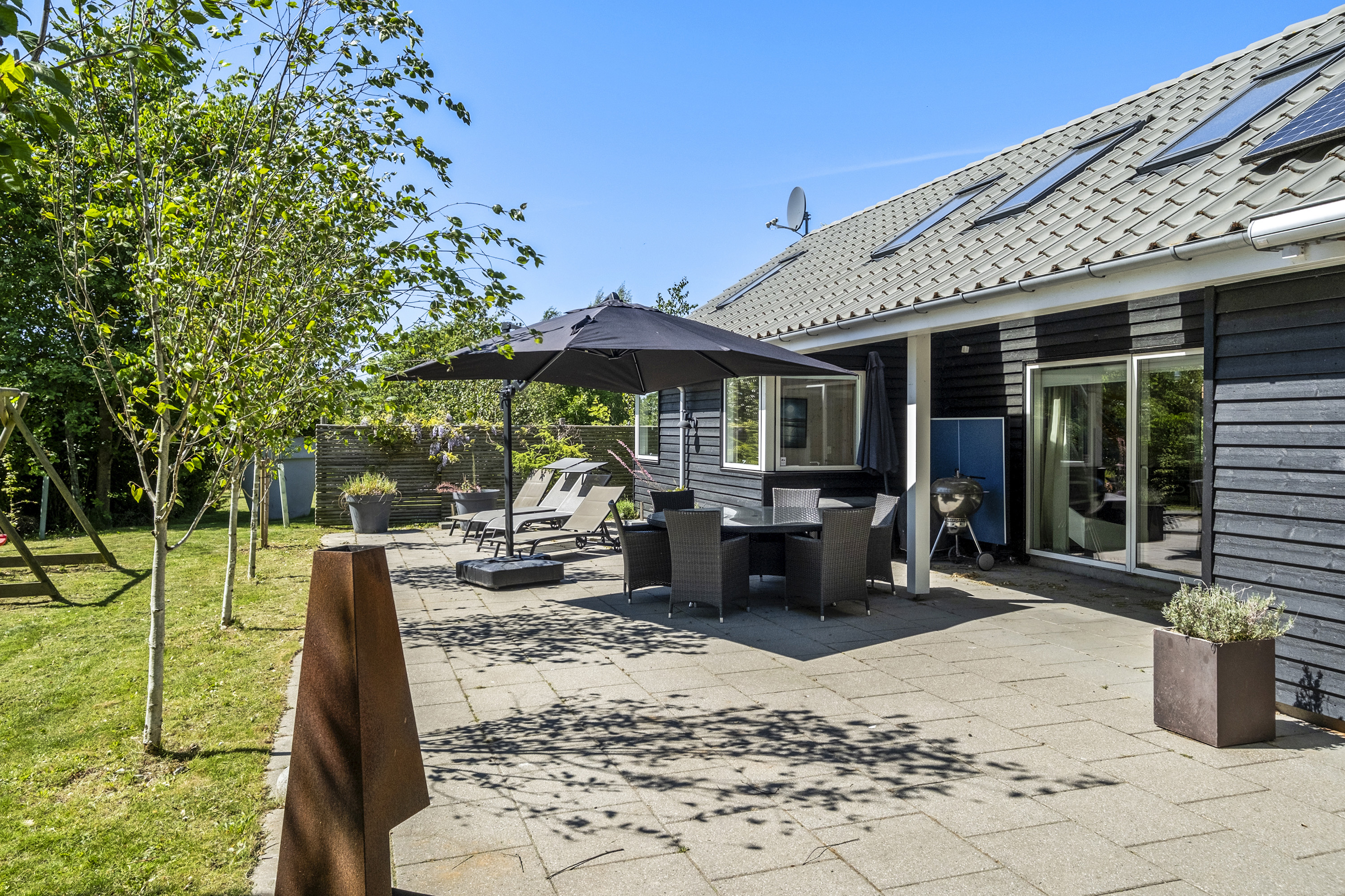 Das Luxusferienhaus Nr. 339 hat eine tolle Terrasse, die mit hochwertigen Gartenmöbeln für 16 Personen ausgestattet ist.
