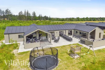 Luxusferienhaus Nr. 619 mit Pool und Außen-Spa in Ålbæk, Nordjütland