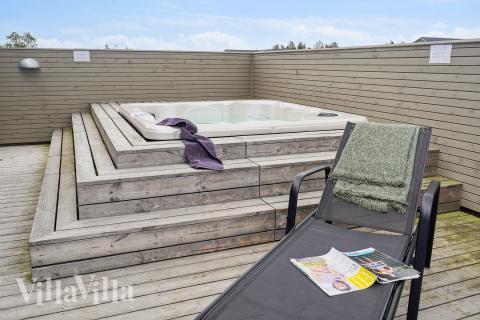 Genießen Sie den warmen Whirlpool im Luxusferienhaus Nr. 619 in Nordjütland