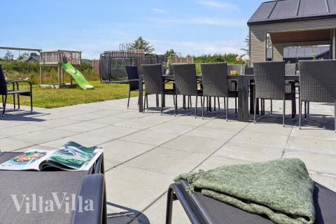 Das Luxusferienhaus Nr. 619 hat eine tolle Terrasse, die mit hochwertigen Gartenmöbeln für 30 Personen ausgestattet ist.