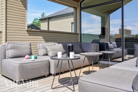 Genießen Sie einen Grillabend auf der Terrasse des Luxusferienhauses Nr. 619 in Nordjütland