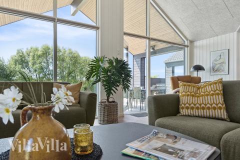 Die Couch im Luxusferienhaus Nr. 667 in Fünen und seine Inseln lädt zu Gesellschaftsspielen oder zu Kinoabenden ein.