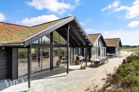 Das Luxusferienhaus Nr. 383 hat eine tolle Terrasse, die mit hochwertigen Gartenmöbeln für 18 Personen ausgestattet ist.