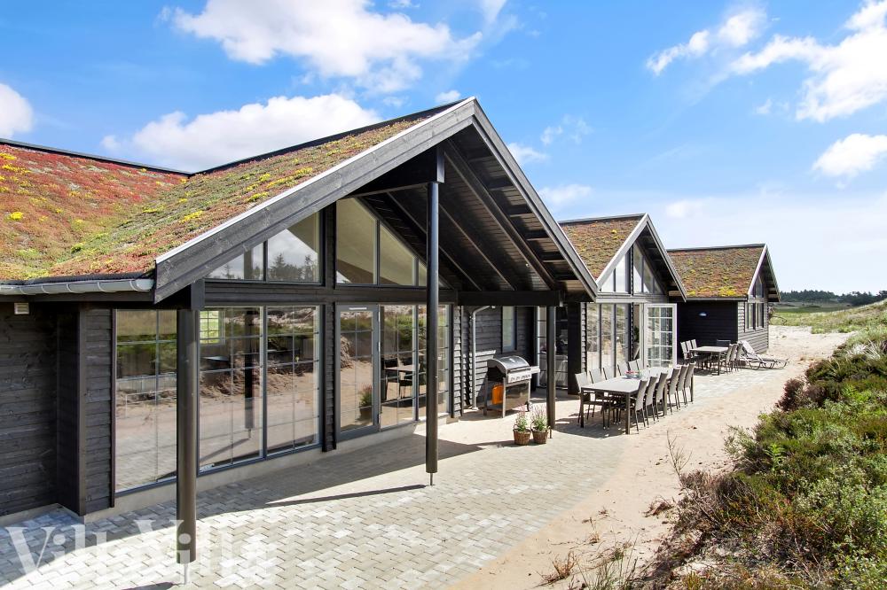 Das Luxusferienhaus Nr. 383 hat eine tolle Terrasse, die mit hochwertigen Gartenmöbeln für 18 Personen ausgestattet ist.