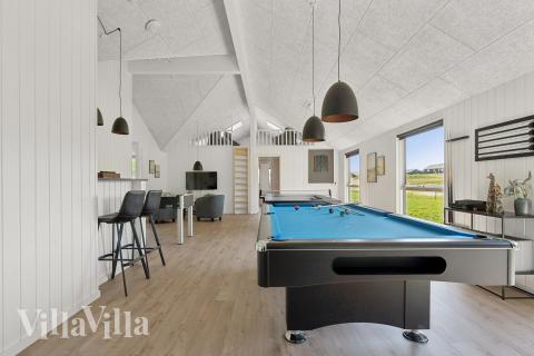 Neben den vielen schönen Stunden, die man im Poolbereich des Hauses verbringen kann, bietet das Luxusferienhaus 657 auch Spielevergnügen bei Billard/Tischtennis und Darts