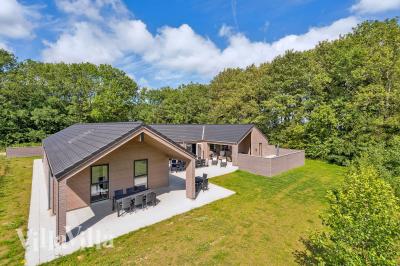 Dieses schöne Poolhaus Nr. 612 mit Platz für 24 Personen liegt in Südjütland