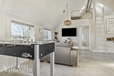 Das Luxusferienhaus 182 für 20 Personen hat einen großen Aktivitätsraum mit u. a. Billard und Darts