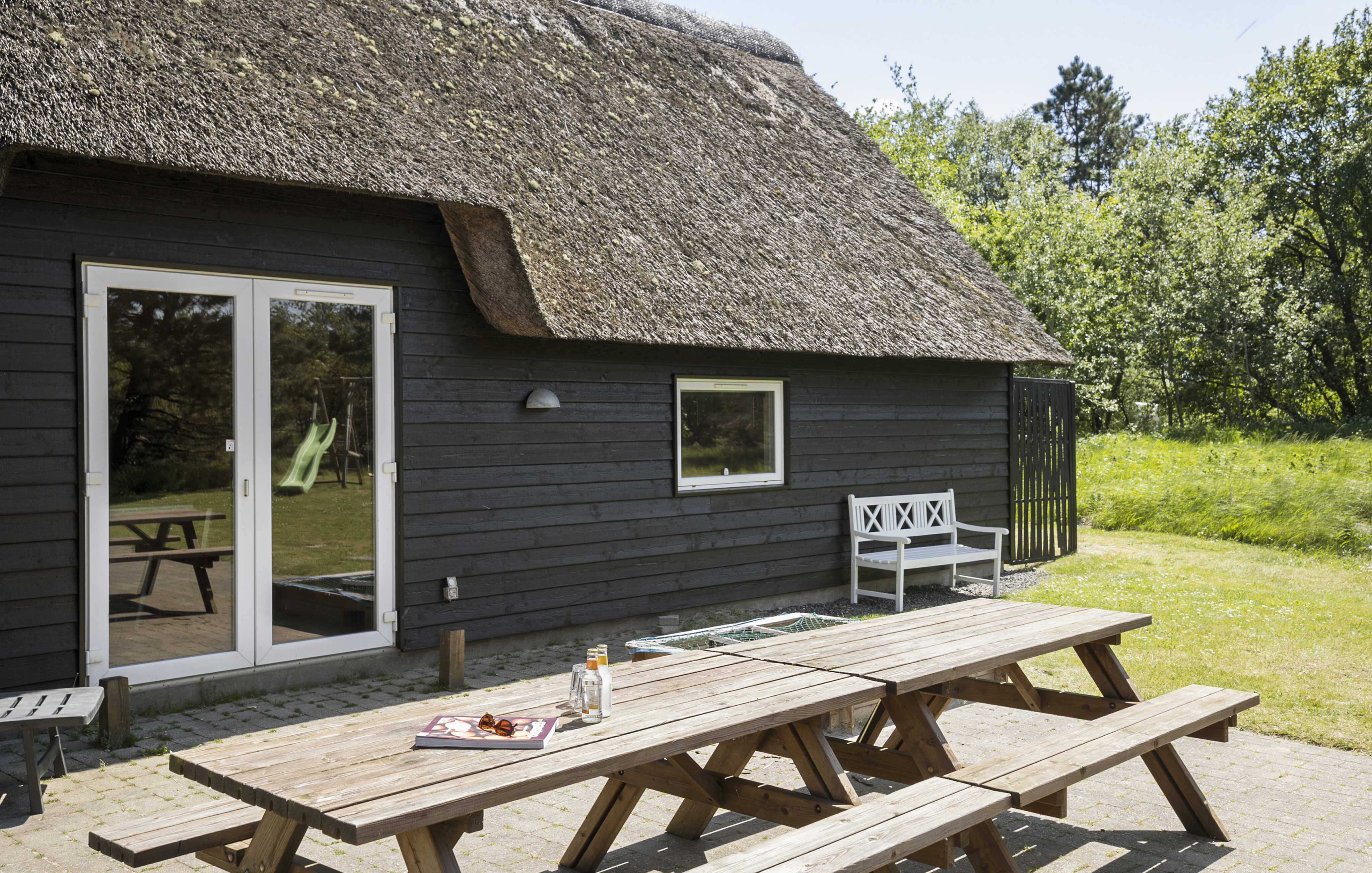 Genießen Sie einen Grillabend auf der Terrasse des Luxusferienhauses Nr. 182 in Südjütland