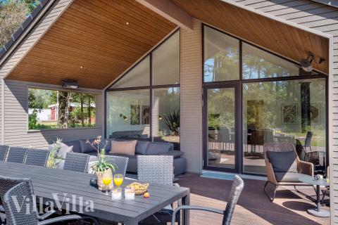 Genießen Sie einen Grillabend auf der Terrasse des Luxusferienhauses Nr. 593 in Südjütland