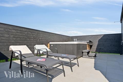 Das Luxusferienhaus Nr. 667 bietet u. a. einen tollen Whirlpool