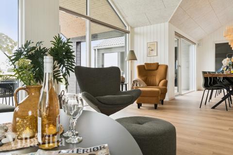 Die Couch im Luxusferienhaus Nr. 668 in Fünen und seine Inseln lädt zu Gesellschaftsspielen oder zu Kinoabenden ein.