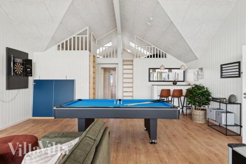 Neben den vielen schönen Stunden, die man im Poolbereich des Hauses verbringen kann, bietet das Luxusferienhaus 695 auch Spielevergnügen bei Billard/Tischtennis und Darts