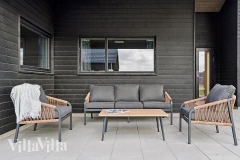 Genießen Sie einen Grillabend auf der Terrasse des Luxusferienhauses Nr. 695 in Fünen und seine Inseln