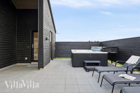 Das Luxusferienhaus Nr. 695 bietet u. a. einen tollen Whirlpool