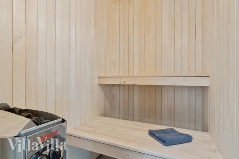 Genießen Sie die heiße Sauna im Luxusferienhaus Nr. 811 für 16 Personen