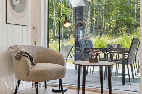 Aufenthaltsraum mit Platz für 16 im Luxusferienhaus Nr. 811.