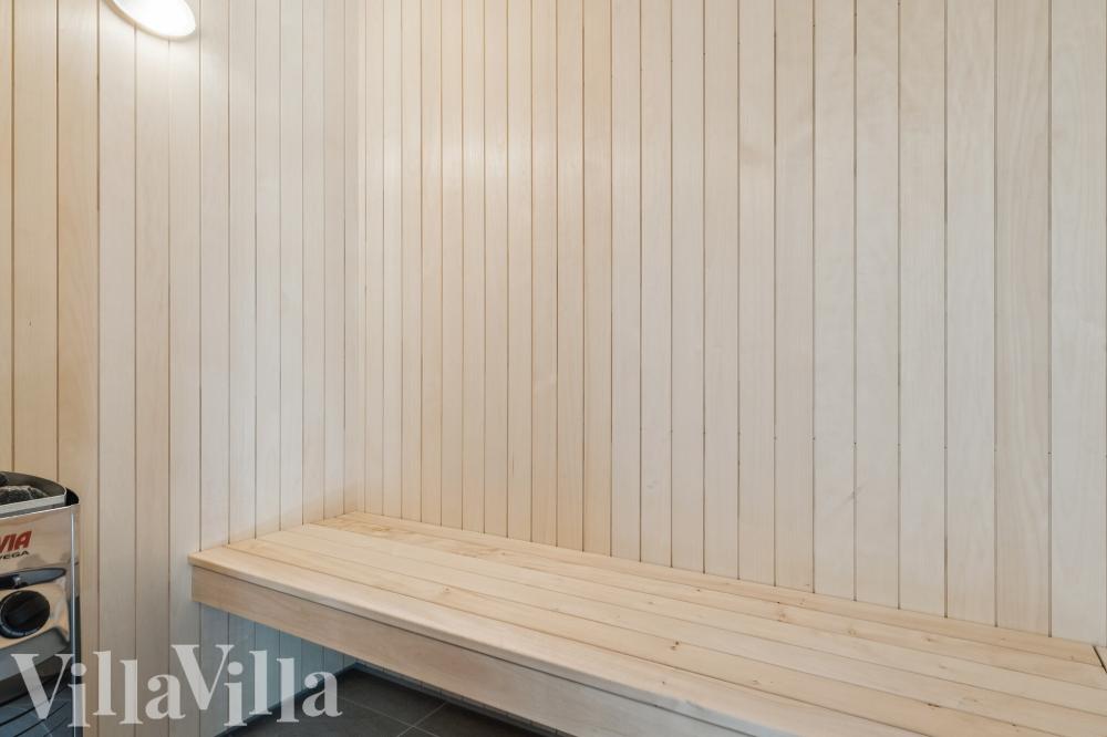 Genießen Sie die heiße Sauna im Luxusferienhaus Nr. 815 für 26 Personen