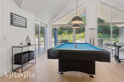 Das Luxusferienhaus 815 für 26 Personen hat einen großen Aktivitätsraum mit u. a. Billard und Darts