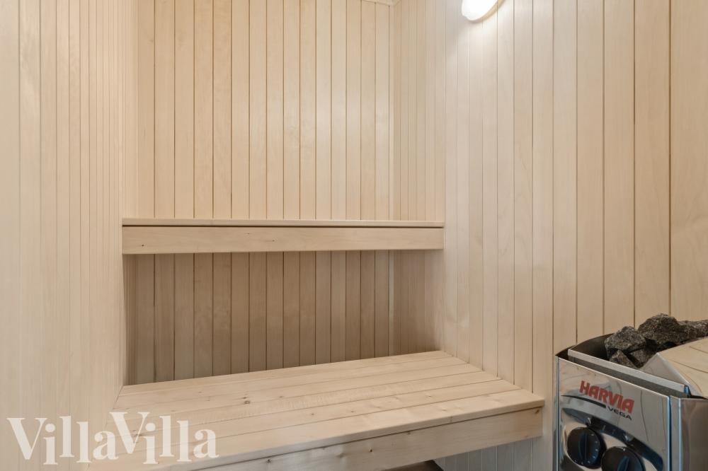 Genießen Sie die heiße Sauna im Luxusferienhaus Nr. 817 für 24 Personen