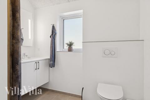 Eines der Badezimmer im Luxusferienhaus Nr. 817