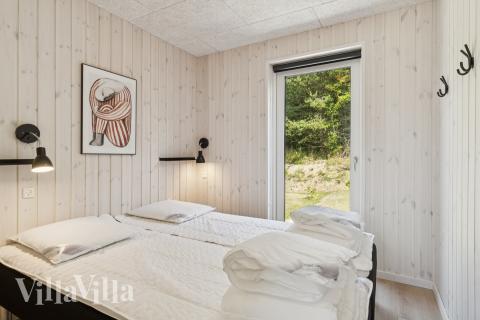 Eines der 9 Schlafzimmer im Luxusferienhaus Nr. 817