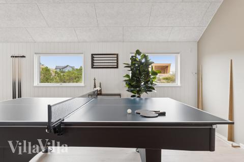 Das Luxusferienhaus 672 für 18 Personen hat einen großen Aktivitätsraum mit u. a. Billard und Darts