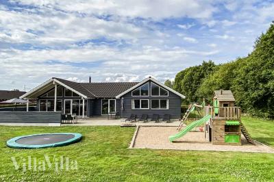 Dieses schöne Poolhaus Nr. 281 mit Platz für 18 Personen liegt in Südjütland