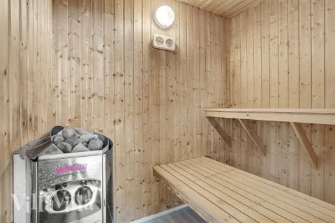 Genießen Sie die heiße Sauna im Luxusferienhaus Nr. 281 für 18 Personen