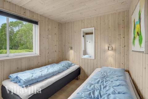 Eines der 7 Schlafzimmer im Luxusferienhaus Nr. 281