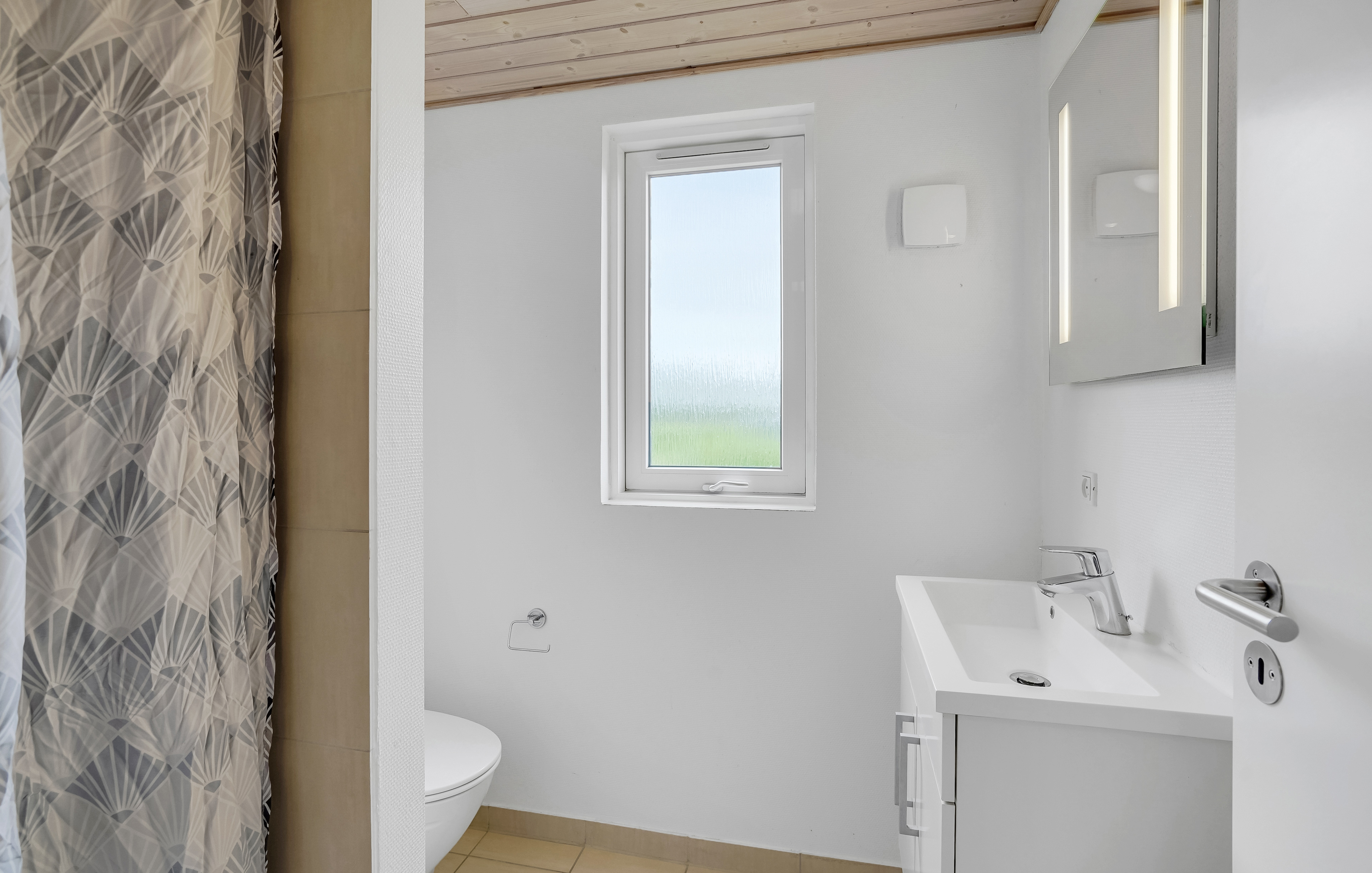 Eines der Badezimmer im Luxusferienhaus Nr. 281