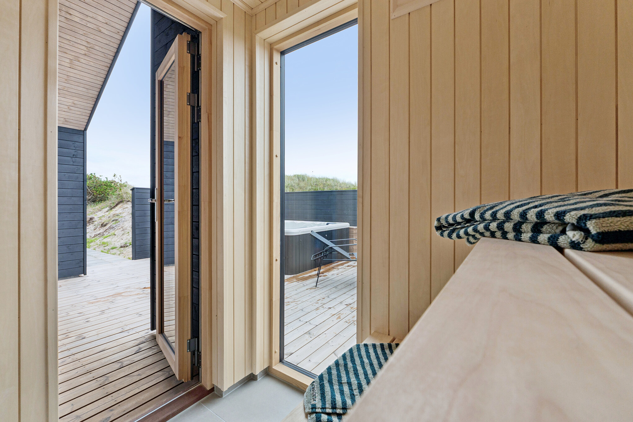 Genießen Sie die heiße Sauna im Luxusferienhaus Nr. 672 für 18 Personen
