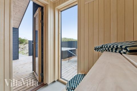 Genießen Sie die heiße Sauna im Luxusferienhaus Nr. 672 für 18 Personen