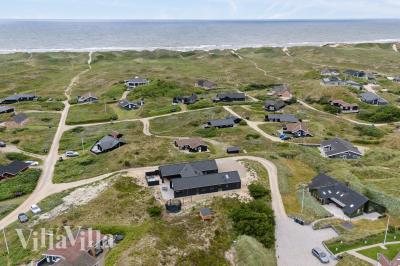 Dieses schöne Poolhaus Nr. 672 mit Platz für 18 Personen liegt in Westjütland