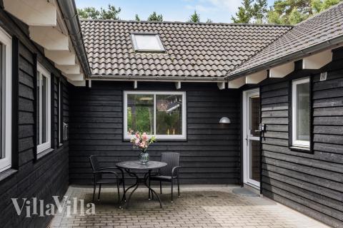 Genießen Sie einen Grillabend auf der Terrasse des Luxusferienhauses Nr. 367 in Nordseeland