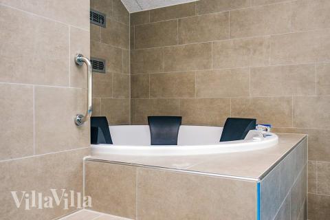 Genießen Sie den warmen Whirlpool im Luxusferienhaus Nr. 670 in Lolland/Falster/Mön