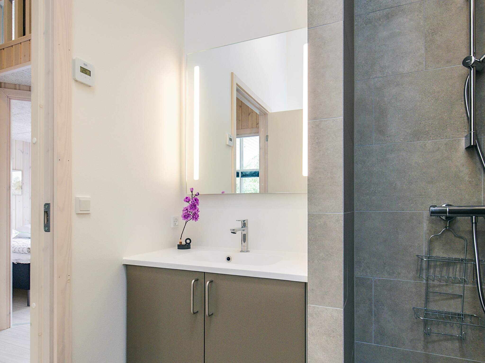 Eines der Badezimmer im Luxusferienhaus Nr. 670