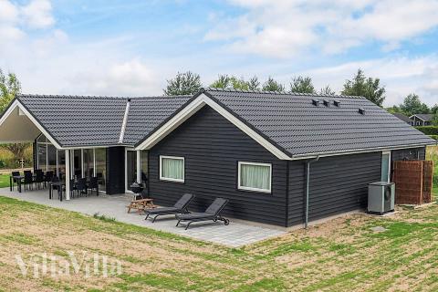 Dieses schöne Poolhaus Nr. 670 mit Platz für 12 Personen liegt in Lolland/Falster/Mön