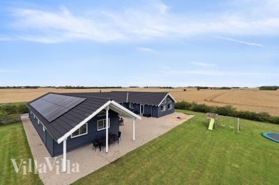 Dieses schöne Poolhaus Nr. 404 mit Platz für 24 Personen liegt in Limfjord
