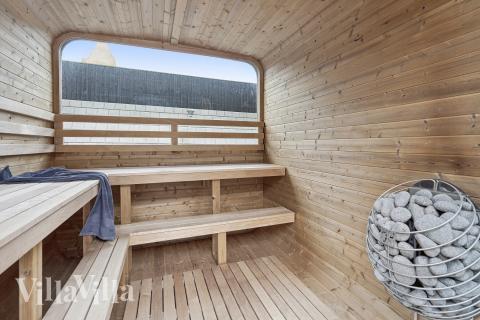 Genießen Sie einen Grillabend auf der Terrasse des Luxusferienhauses Nr. 680 in Nordjütland