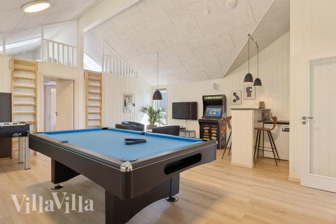 Neben den vielen schönen Stunden, die man im Poolbereich des Hauses verbringen kann, bietet das Luxusferienhaus 616 auch Spielevergnügen bei Billard/Tischtennis und Darts