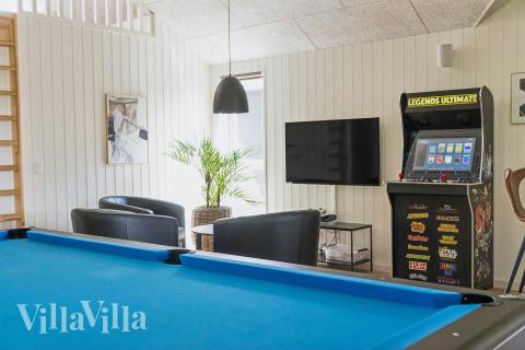 Aktivitätsraum im Luxusferienhaus Nr. 616 mit 6 Schlafzimmern und Platz für 16 Gäste.