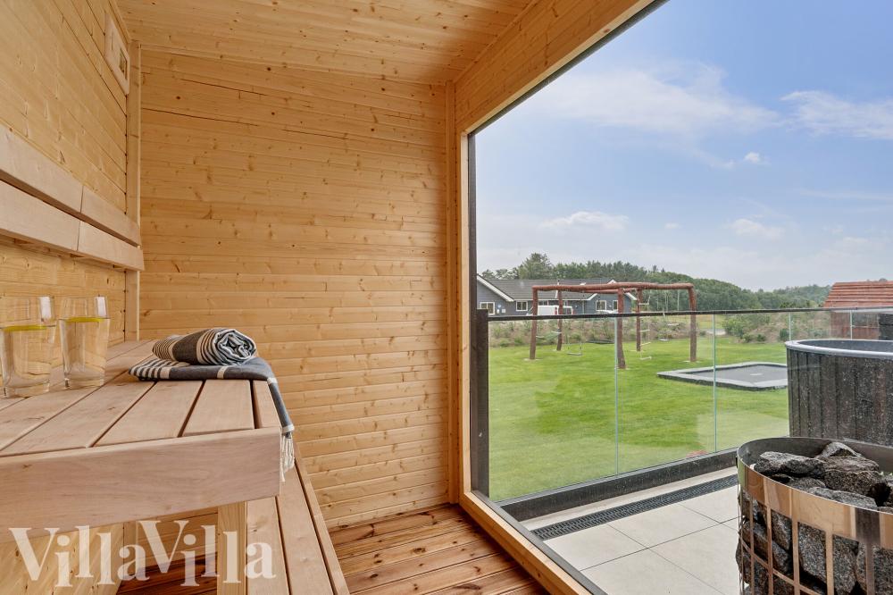 Genießen Sie die heiße Sauna im Luxusferienhaus Nr. 686 für 36 Personen