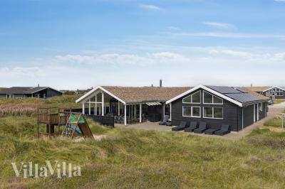 Dieses schöne Poolhaus Nr. 292 mit Platz für 18 Personen liegt in Westjütland