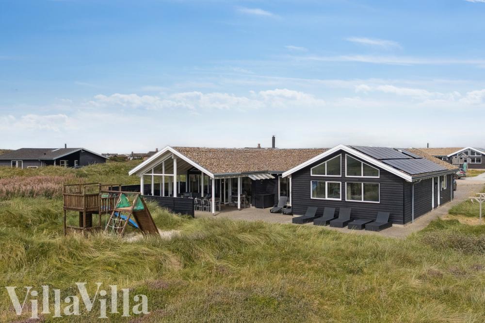 Dieses schöne Poolhaus Nr. 292 mit Platz für 18 Personen liegt in Westjütland