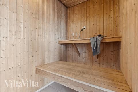 Genießen Sie die heiße Sauna im Luxusferienhaus Nr. 292 für 18 Personen