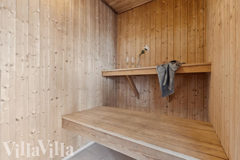 Genießen Sie die heiße Sauna im Luxusferienhaus Nr. 292 für 18 Personen